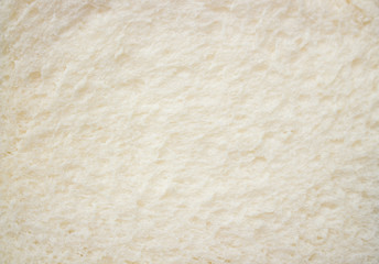 White no crust sandwich bread slices texture close up.