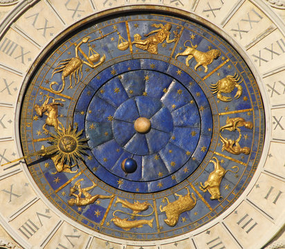 Ancient time, astrology and horoscope. Detail of Saint Mark Square old Clocktower with zodiac signs, plantes ans stars (15th century)