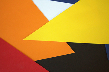 Cut sheets of colored paper.Lie on the table.