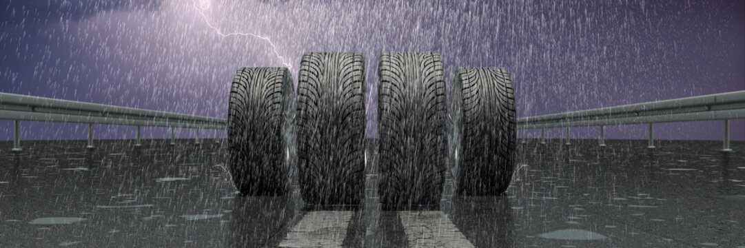 Reifen auf nasser Fahrbahn im Regen