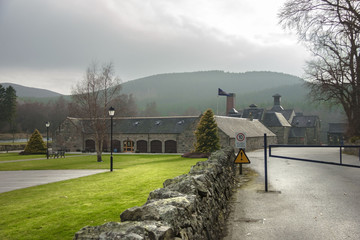 Lochnagar Distillery buildings in Royal Deeside near Ballater. Crathie, Aberdeenshire / Scotland, United Kingdom - April 15th 2018 