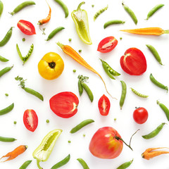  Healthy food concept. Tomatoes, green peas, peppers, carrots  isolated, top view, flat lay.