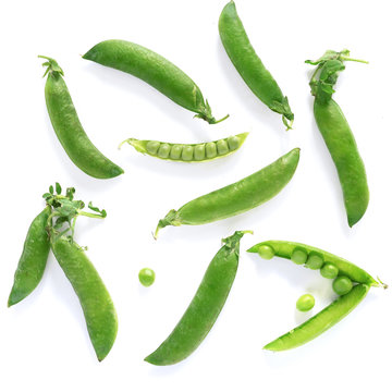 Pattern of fresh green peas isolated on white background, top view, flat lay