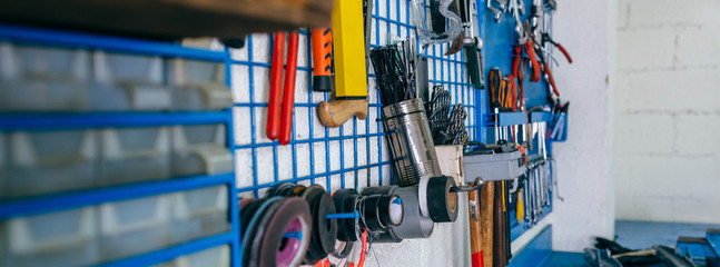 Detail of motorcycle workshop tools board and work bench