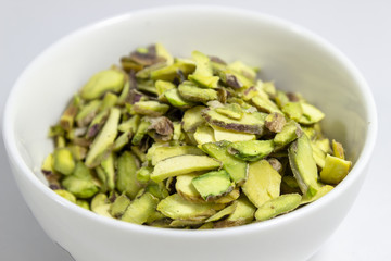 Close-up shot of multiple pinenuts with blurry white background