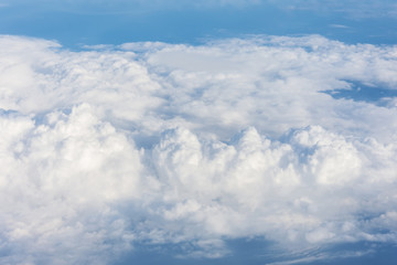 Cloud cumulus from the altitude of the airplane flight, the atmosphere weather.