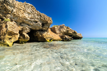 Beautiful crystal clear water at Cittadella dei Maccari, San Lorenzo, Nature Reserve Oasis of Vendicari, Syracuse, Sicily, Italy, Dreamy and idyllic spring holiday destination near Noto and Marzamemi.