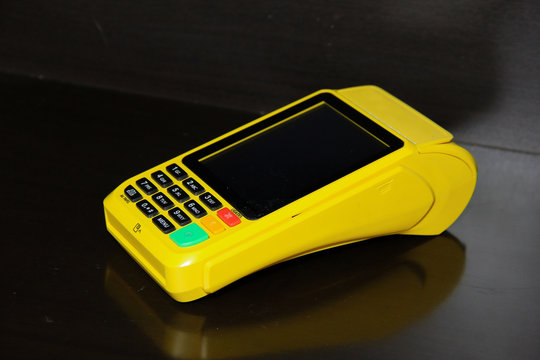 credit card reader on a black background