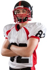 Fototapeta premium Football Player Standing with Arms Folded- Isolated