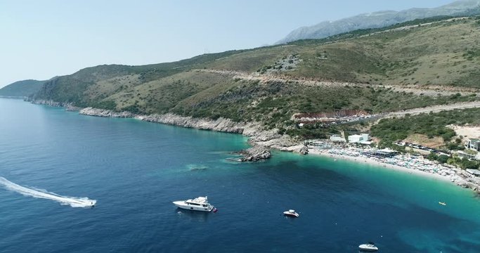 Beautiful beach with yatch parked