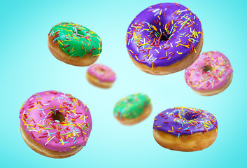 Multiply donuts with violet, pink, green glaze and icing flying on blue background in motion....