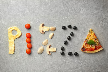 Word PIZZA made of ingredients on grey background, top view