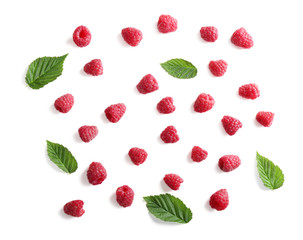 Delicious ripe raspberries with leaves on white background, top view