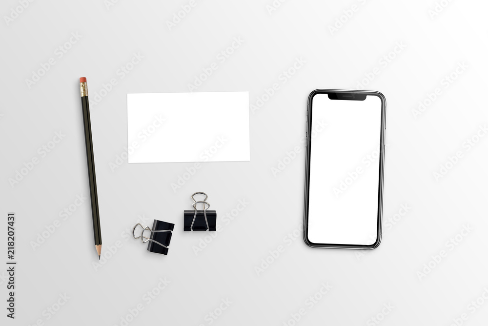 Poster modern smart phone with round edges and business card mockup on white desk. flat lay.