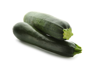 Fresh zucchinis on white background