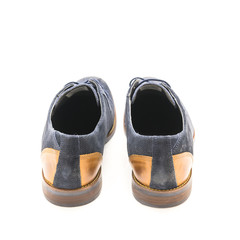 Studio shot top view brand new a pair set dark blue men blucher dress shoes isolated on white...