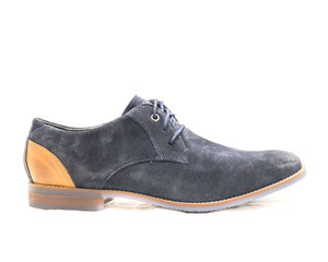 Close-up brand new one dark blue men blucher shoes isolated on white background. Formal dress code...