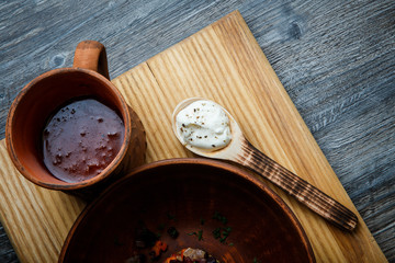 closeup clay dishes with traditional ukrainian food