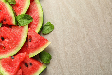Sweet watermelon slices on light background