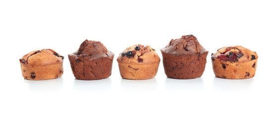Sweet tasty muffins on white background