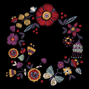 Embroidery round pattern with simplified flowers and butterfly. Vector embroidered floral patch for print and fabric design.