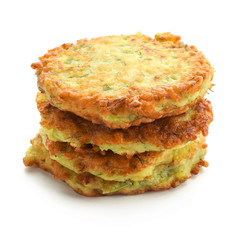 Stack of zucchini pancakes isolated on white