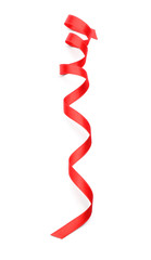 Curled red ribbon on white background