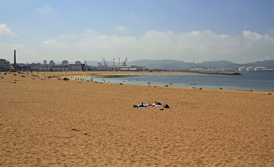 Fototapeta na wymiar the western city beach in Gijon, Spain