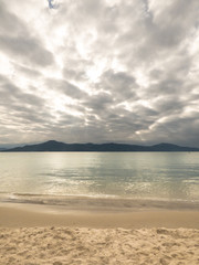 Fototapeta na wymiar Dramatic cloudy sky at Daniela beach - Florianopolis, Brazil