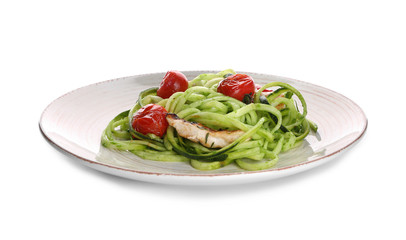 Plate with zucchini spaghetti, tomatoes and meat isolated on white
