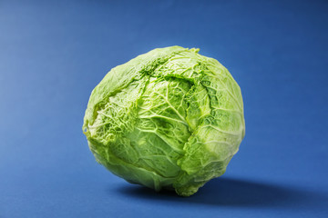 Fresh cabbage on color background