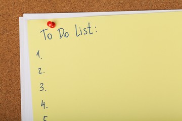 Close-up of To Do List on Bulletin Board