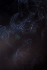 Smoke on a black background.