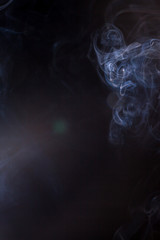 Smoke on a black background.