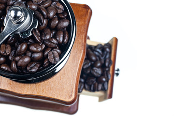 Vintage coffee grinder on a white background.