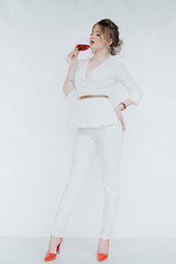 Wine. Red wine. A glass. woman drinks wine. Winemaking. Taste. Alcohol. Aperole. Business lady. A glass of wine. merlot, sauvignon,