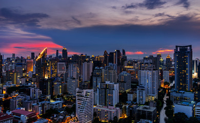 scenic of urban cityscape on sunset with twilight skyline