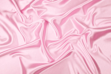 Pink luxury satin fabric texture for background