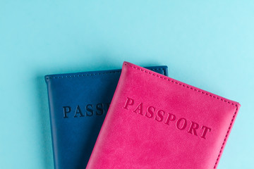 Passports on a blue background. Travel, rest, vacation, vacation. Traveler, tourism. Top view. Copy space