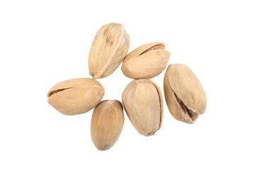 salted pistachios isolated on white background