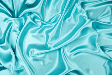 Obraz premium Blue luxury satin fabric texture for background