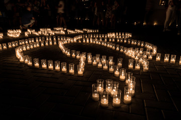 streets illuminated by Candles drawing shapes on The night of the candles celebration at Titaguas...