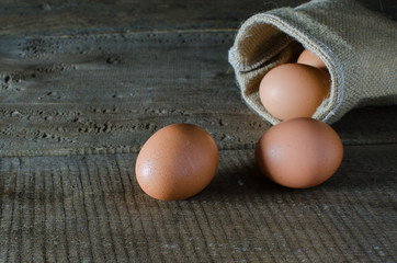 egg in sack on the wood floor