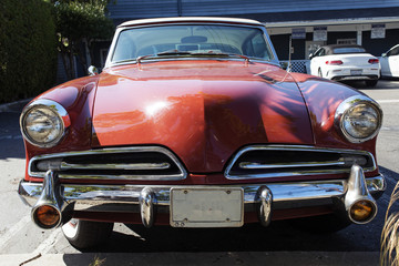 Obraz na płótnie Canvas A front view of a classic vintage American car 