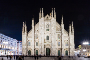 Fototapeta na wymiar Catholic Church Duomo Di Milano illuminated at night from Italy