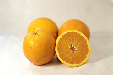 Portrait of oranges (nice composition) on white background. Concept: Fruit, nature, summer, juice