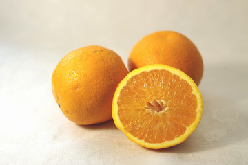 Portrait of oranges (nice composition) on white background. Concept: Fruit, nature, summer, juice