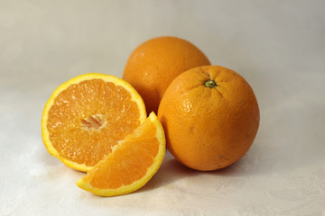 Portrait of oranges (nice composition) on white background. Concept: Fruit, nature, summer, juice