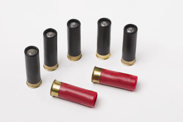 Obraz premium Cartridges from a hunting rifle on an isolated white background. Hunting.