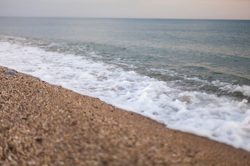 Closeup of Wave of the Sea on a Beach